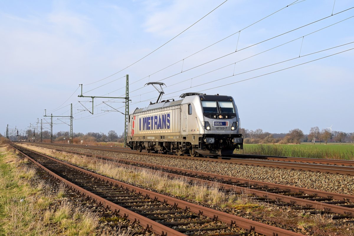 Akiem 187 513, vermietet an METRANS Rail (Deutschland), in Richtung Osnabrück (Diepholz, 24.03.2021).