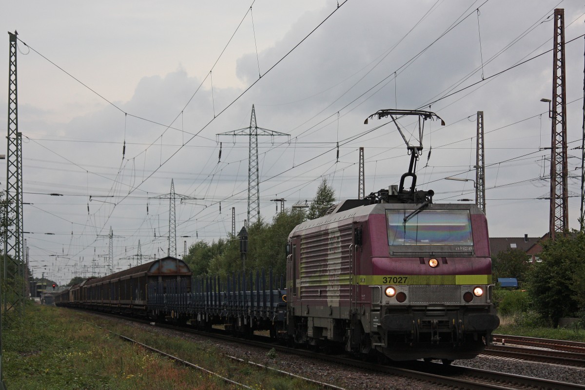 Akiem/HSL 37027 am 17.9.13 mit dem HSL/Saarrail Drathrollenzug von Bremen nach Neunkirchen in Ratingen-Lintorf. 