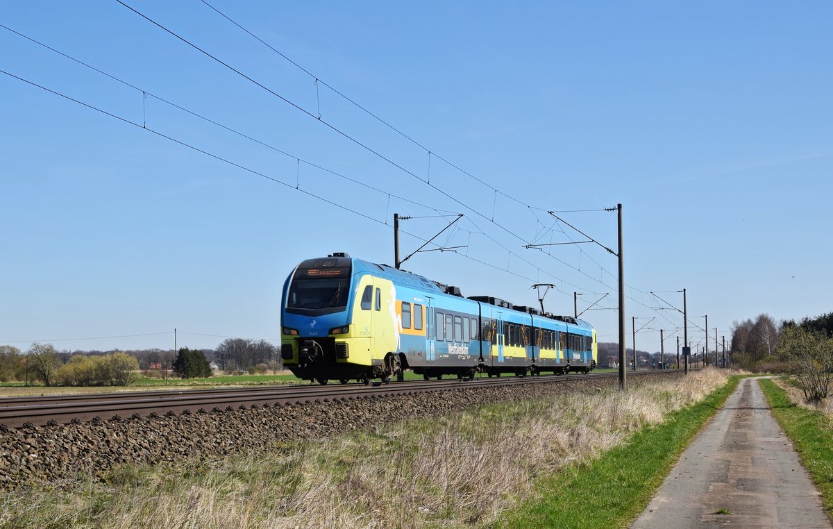 Alpha Trains Europa 1428 112, vermietet an Westfalenbahn (ET 412), als RB 61 (90498)  Wiehengebirgs-Bahn  Bielefeld Hbf - Bad Bentheim (bei Melle, 27.03.17).