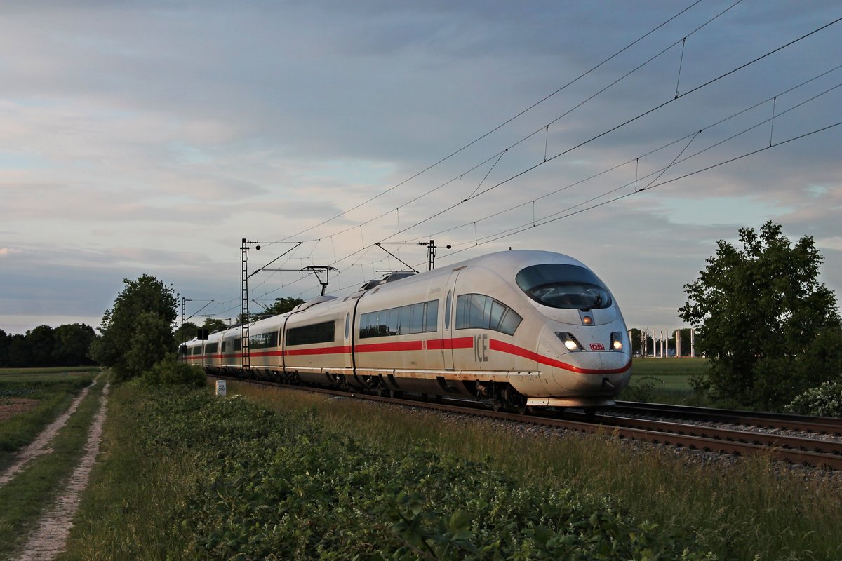 Als ICE 201 (Köln Hbf - Basel SBB) fuhr am Abend des 19.05.2020 der 403 005-2  Baden-Baden  südlich von Buggingen über die Rheintalbahn durchs Makrgräflerland in Richtung Schweiz.