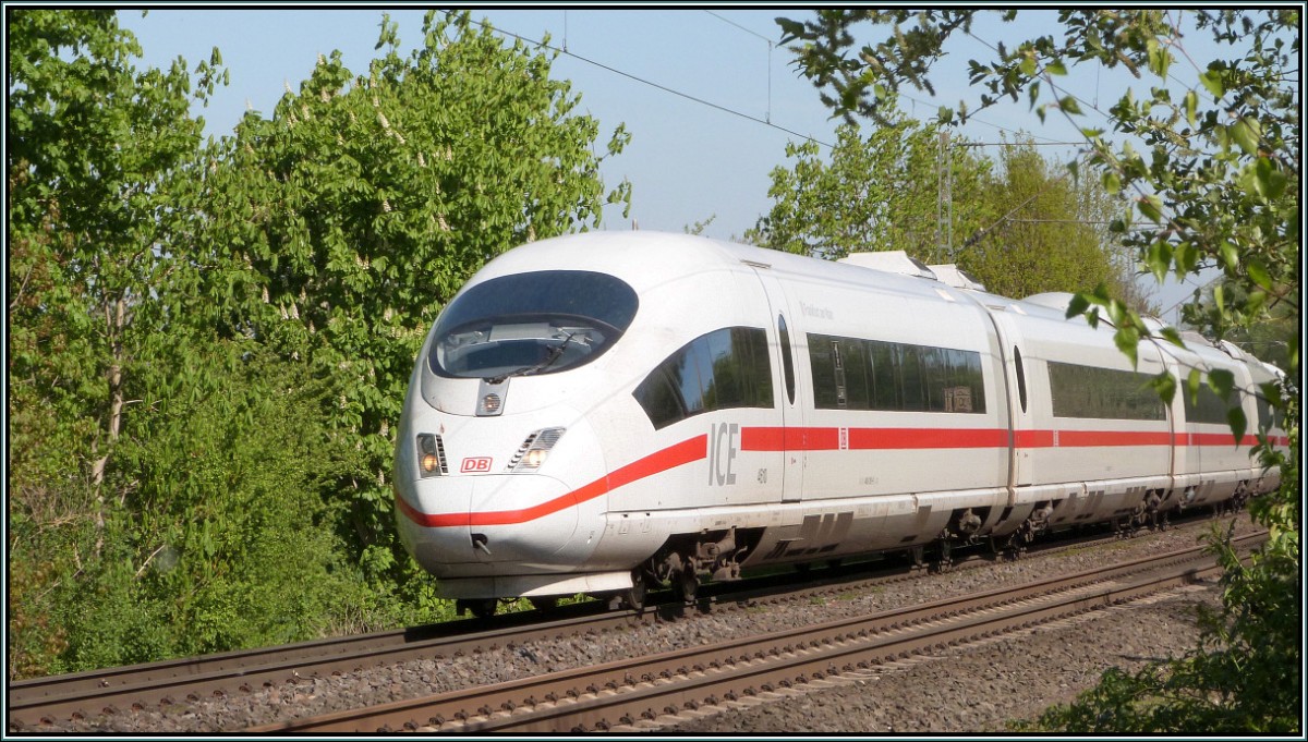 Als Umleiter ist dieser ICE 3 unterwegs nach Brüssel (B). Hier zu sehen im Gleisbogen bei Rimburg auf der Kbs 485 am 16.April 2014.