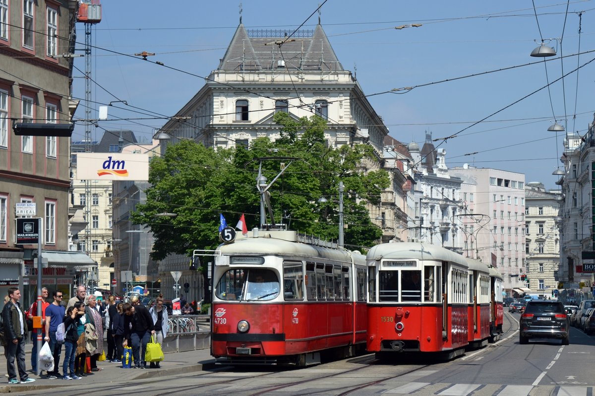 Altwagen trifft auf Oldtimer:

Wiener Linien E1 4730 + c4 1319 und Tramwaytag Shuttle M 4148 + k6 1518 + k6 1530 bei der Haltestelle Spitalgasse, Währinger Straße, 06.05.2017