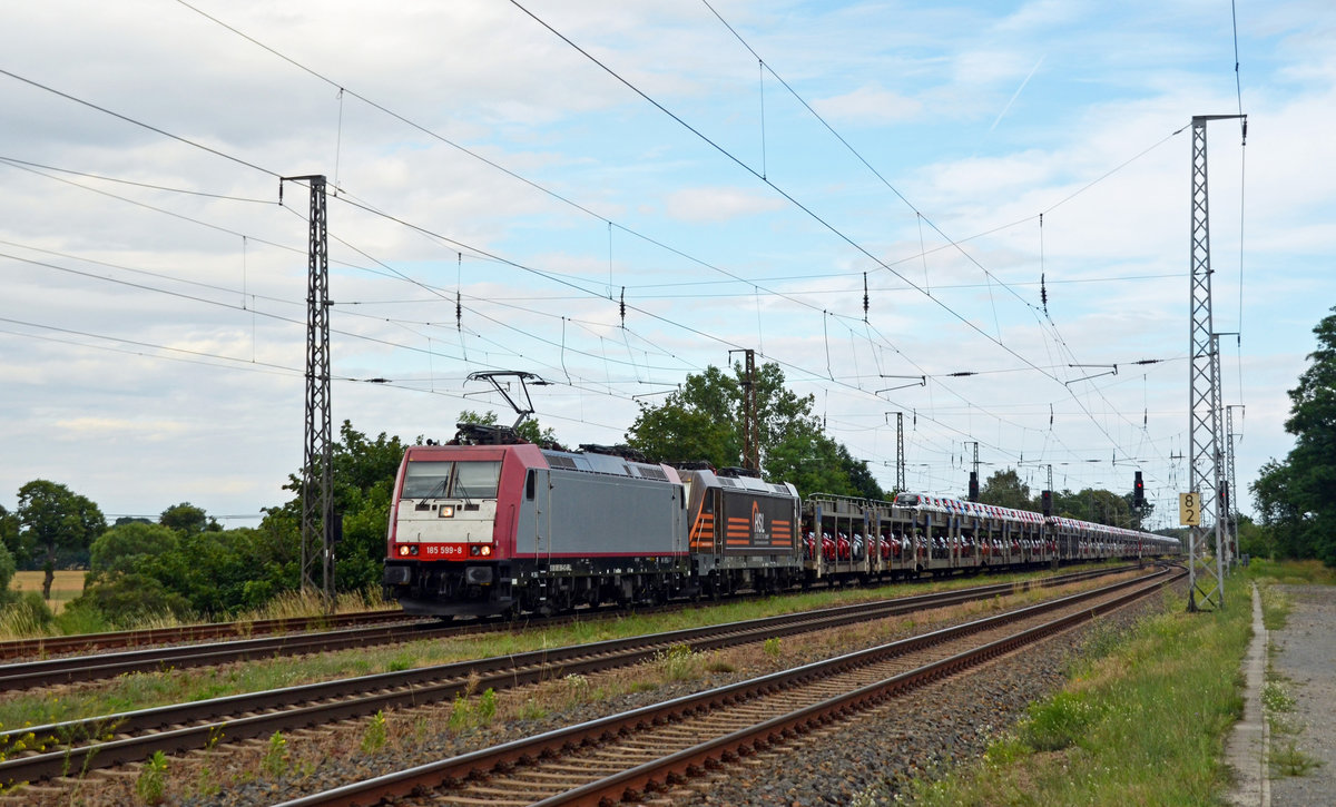 Am 01.07.20 führte die ehemalige Crossrail_lok noch in den Farben des Vorbesitzers für die HSL einen Autozug durch Saarmund Richtung Potsdam. Hinter der zuglok wurde 187 535 mitgeschleppt.