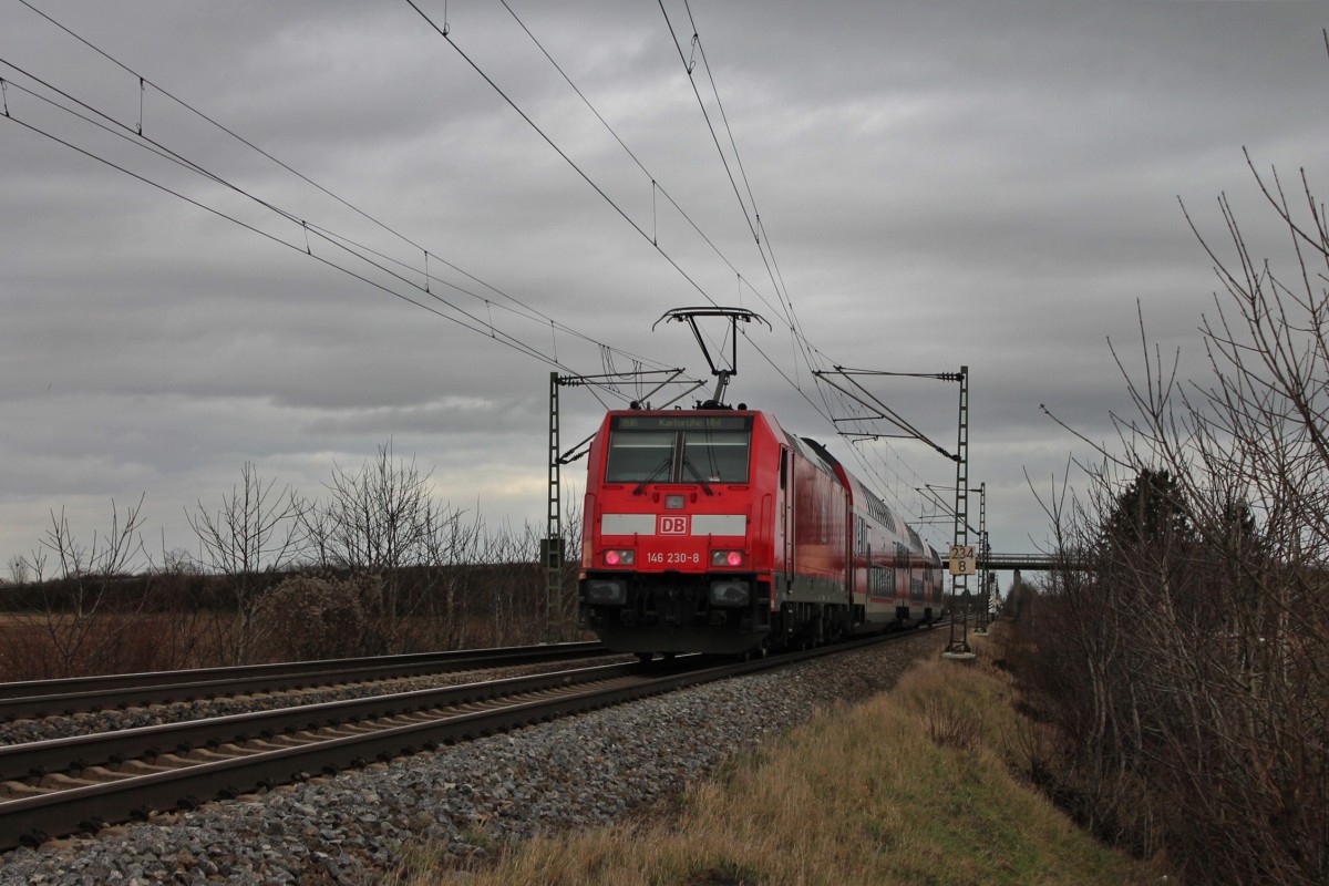 Am 03.01.2014 bespannte die Freiburger 146 230-8  Radolsfzell  die RB 26562 (Neuenburg (Baden) - Karlsruhe Hbf), als sie nördlich von Müllheim (Baden) gen Freiburg fuhr.
