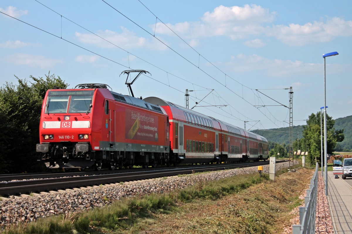 Am 08.07.2013 fuhr 146 110-2  Baden-Wrttemberg erfahren , die auf dem Namen Mllheim (Baden)getauft ist, zusammen mit RE 5343 (Offenburg - Basel SBB) an der Ortschaft Sexau in Richtung Freiburg vorbei.