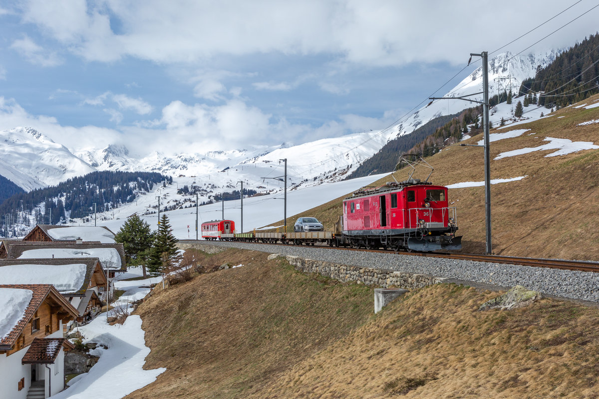 Am 10.04.2021 ist die HGe 4/4 I von Andermatt UR nach Sedrun GR unterwegs und konnte in Sedrun GR aufgenommen werden. Ausnahmsweise bespannte an diesem Tag die bereits Historische HGe 4/4 I Nr 36. den Autozug Oberalp. Normalerweise ist hier ein Triebwagen des Typ Deh 4/4 BVZ anzutreffen.
