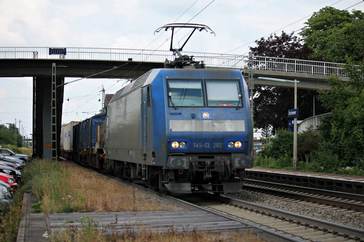 Am 11.07.2014 fuhr mit einem Containerzug nach Italien die 145-CL 202 von Crossrail gen Süden durch Orschweier.