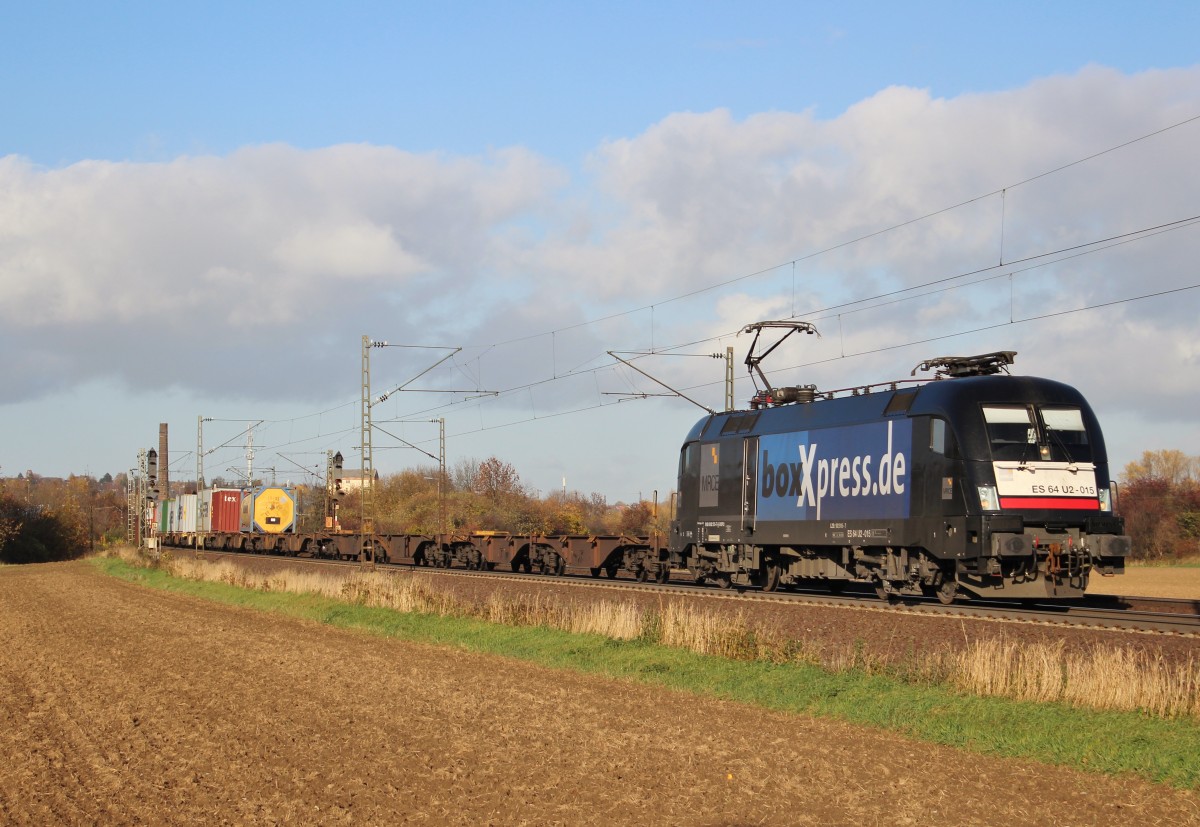 Am 13.November 2013 war MRCE/BOXXPRESS 182 515 mit einem schwach ausgelasteten Containerzug bei Elze(Han) auf dem Weg Richtung Sden.