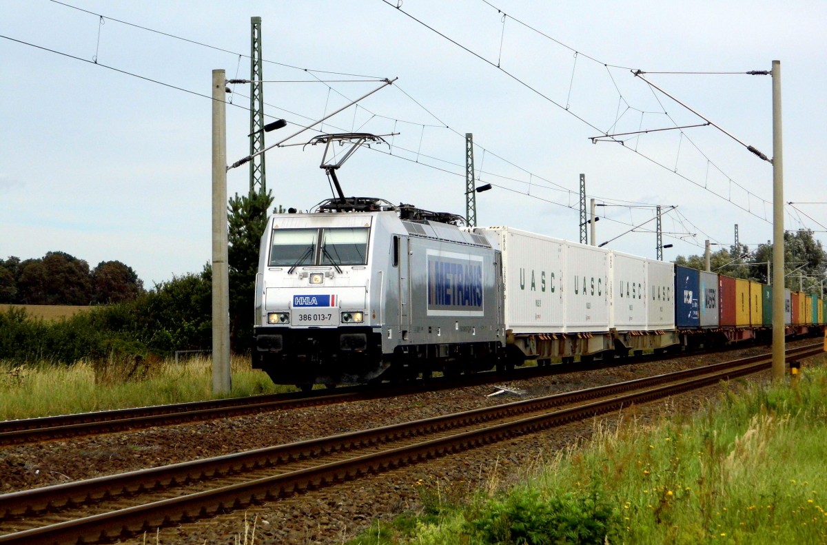 Am 15.09.2015 kam die 386 013-7 von der METRANS aus der Richtung Stendal nach Demker und fuhr weiter in Richtung Magdeburg .