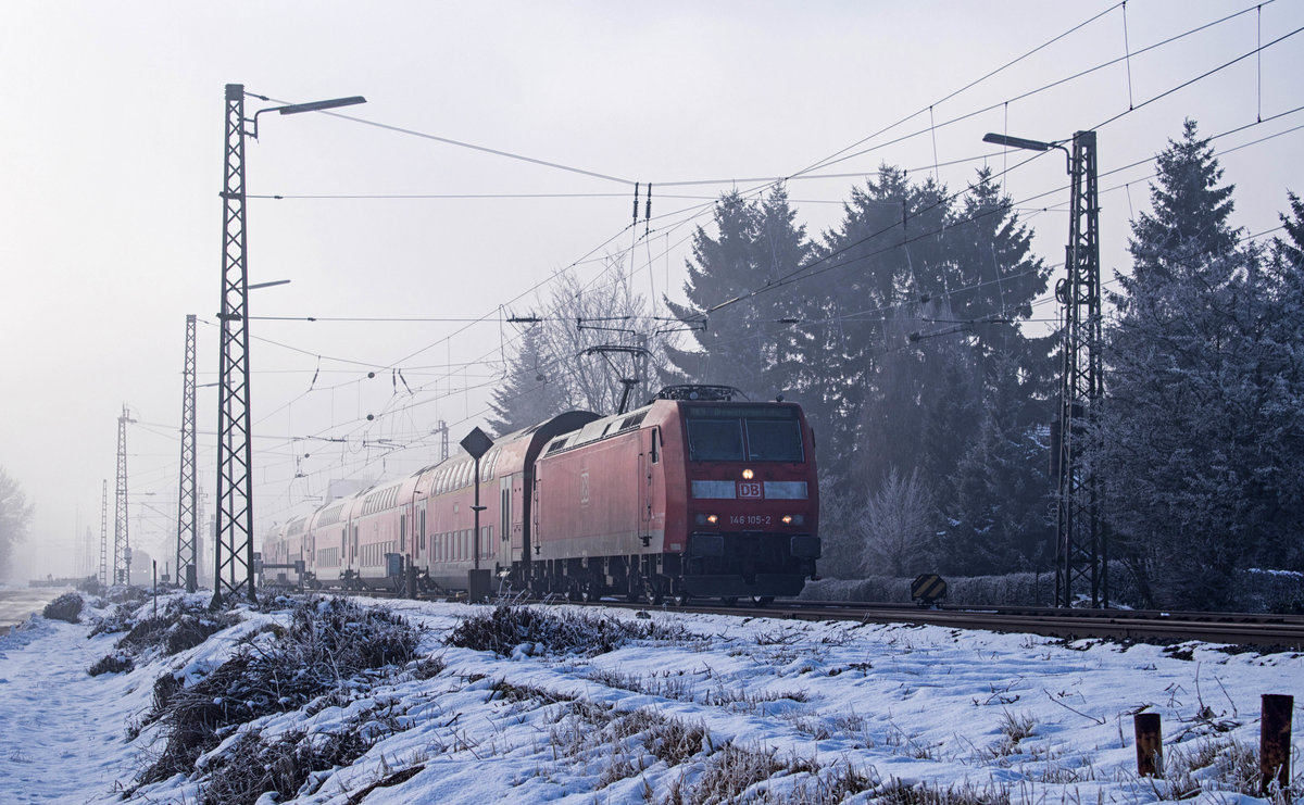 Am 16.01.2017 zog 146 105 ihren Regional Express der Linie 9 von Osnabrück Hbf nach Bremerhaven Lehe aus dem Bahnhof Twistringen.