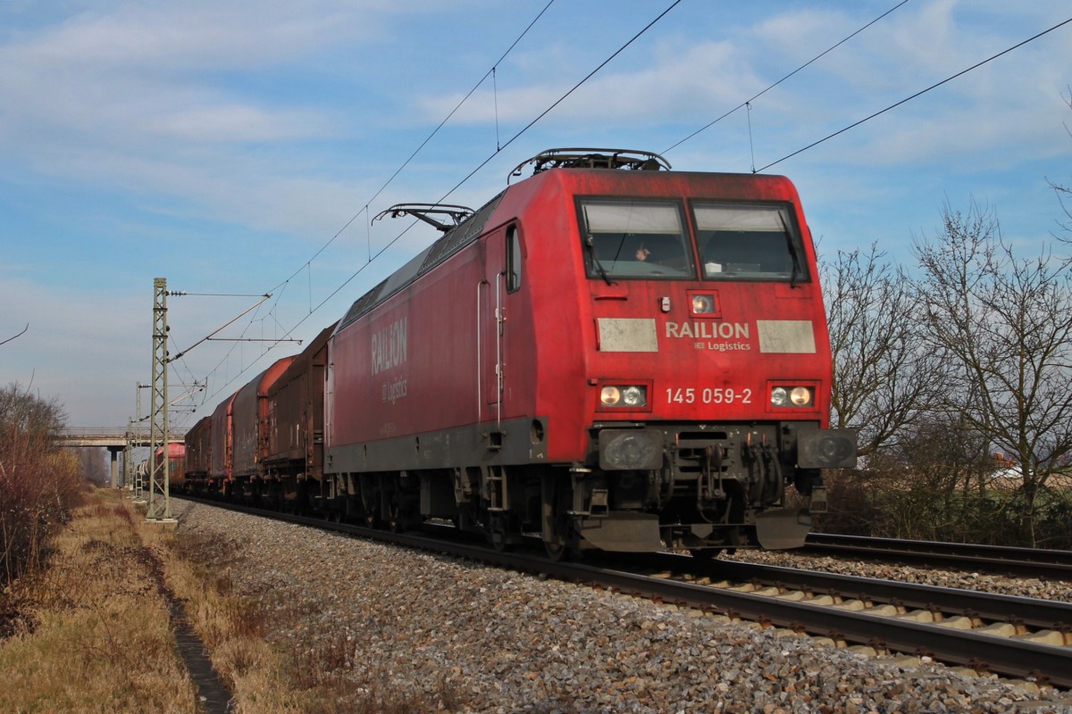 Am 18.01.2014 fuhr 145 059-2 mit einem gemischten Güterzug südlich von Buggingen gen Basel. Gruß an den netten Tf zurück !