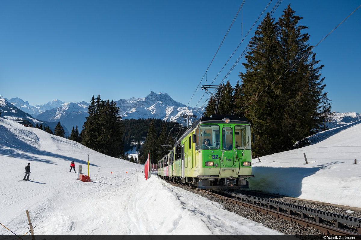 Am 21.02.2021 ist TPC/BVB BDeh 4/4 82 unterwegs in Richtung Endstation Col de Bretaye und konnte hier vor der Station Villars sur Ollon Golf aufgenommen werden.
