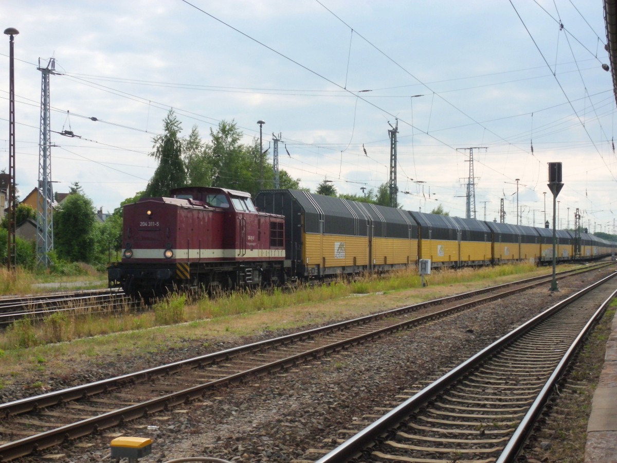 Am 21.06.2015 kam 204 311 mit ihrem Autozug aus Richtung Wittenberge nach Stendal und fuhr weiter nach Magdeburg.
