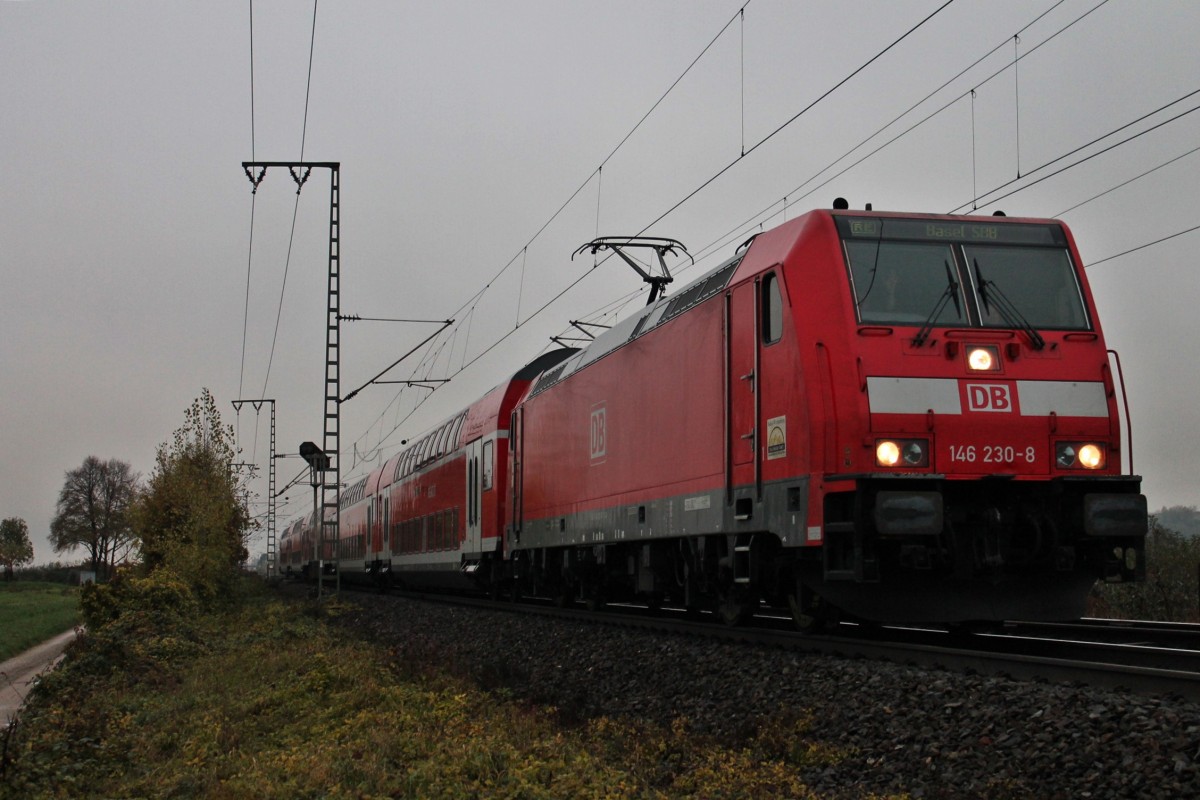 Am 22.11.2013 fuhr die Freiburger 146 230-8 mit dem RE 5341 (Offenburg - Basel SBB) in den Bahnhof von Müllheim (Baden) ein. Gruß an den netten Tf!