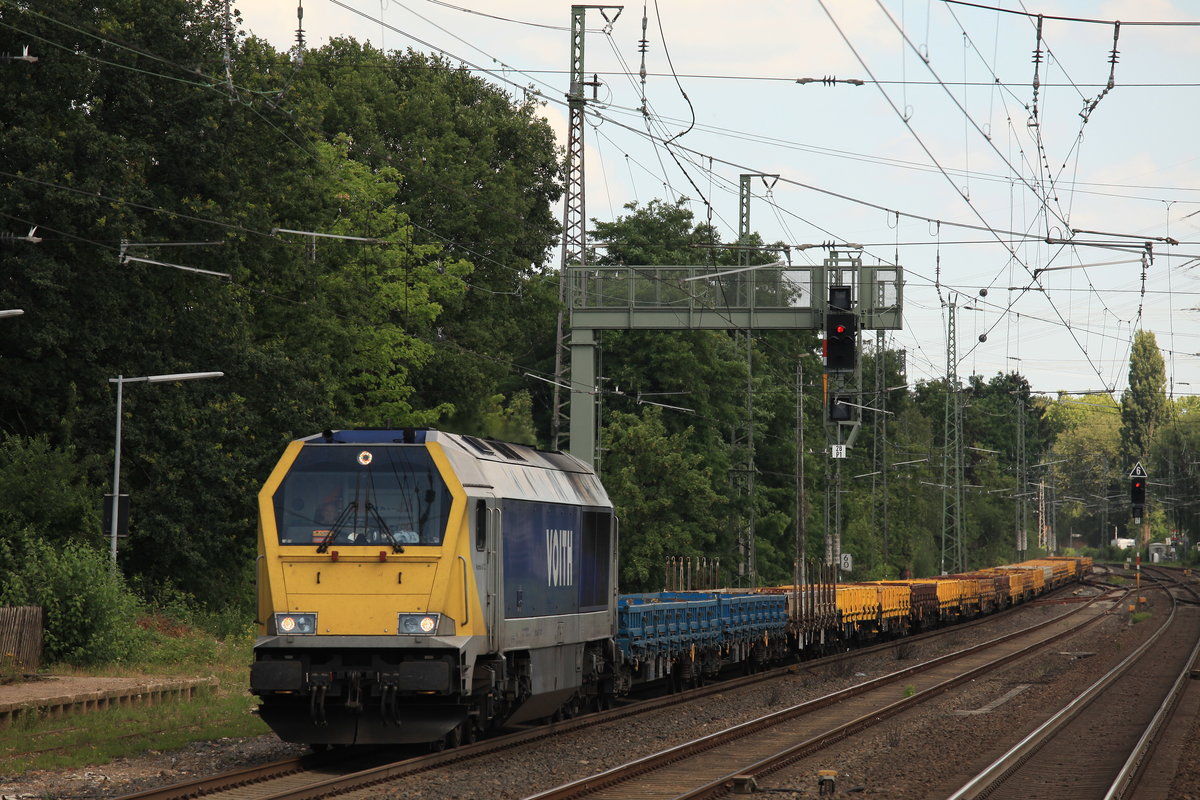 Am 25.06.2020 zog die STOCK´s Maxima 40 CC, um genau zu sein 264 001, einen leeren Schotterzug richtung Opladen durch Solingen-Ohligs.