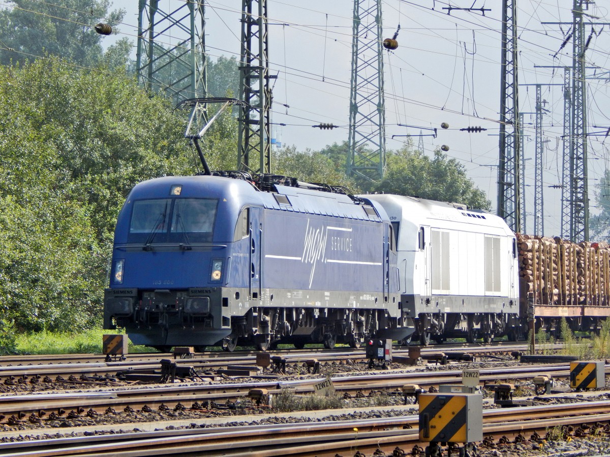 Am 26.9 kam 183 500 von mgw mit der 223 143 von NRS und dem Holzzug aus Bonn Beuel durch Köln Gremberg gefahren. Ziel des Zuges war Niedergörne bei Stendal.

Gremberg 26.09.2015