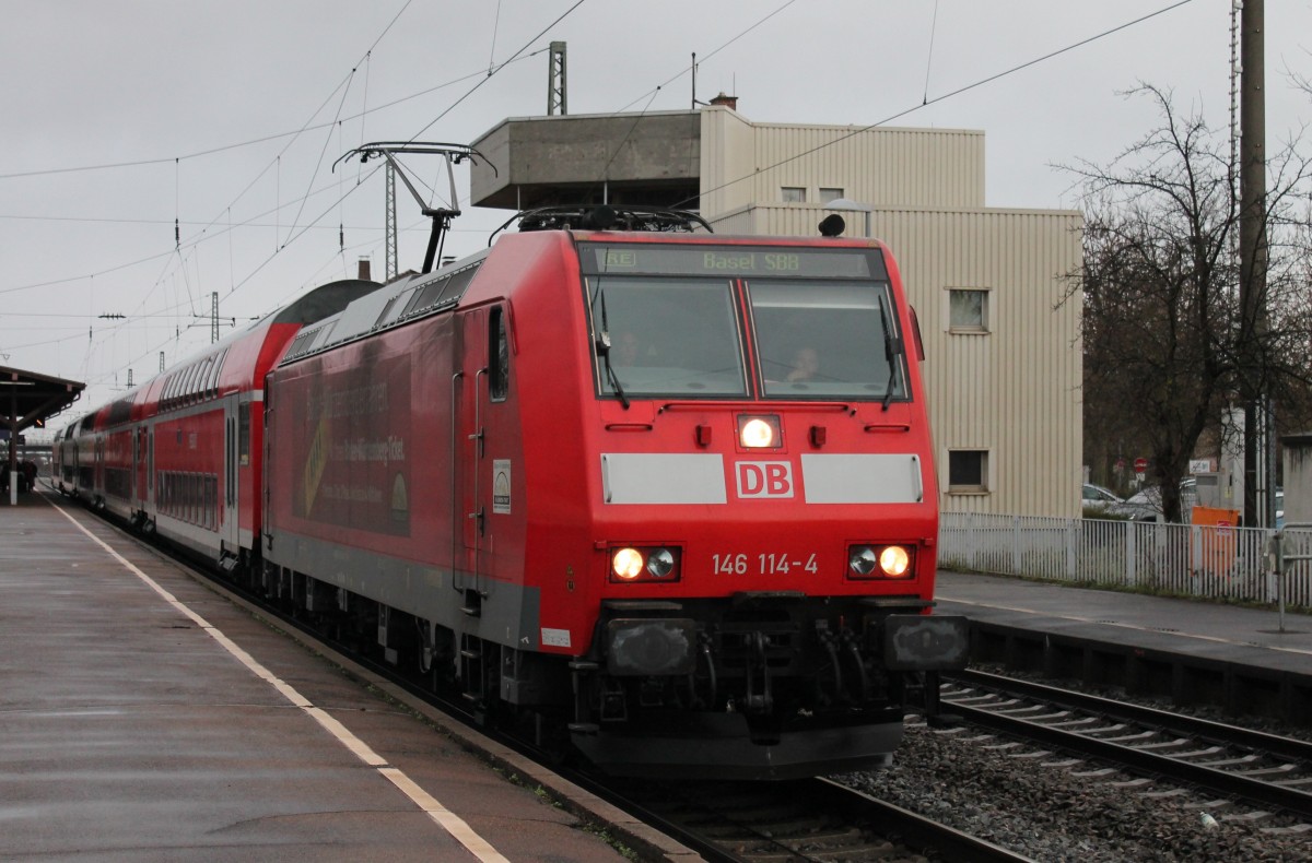 Am 28.02.2014 fuhr RE 5345 (Offenburg - Basel SBB) mit der Freiburger 146 114-4  Baden-Württemberg erfahren  in Müllheim (Baden) aus.