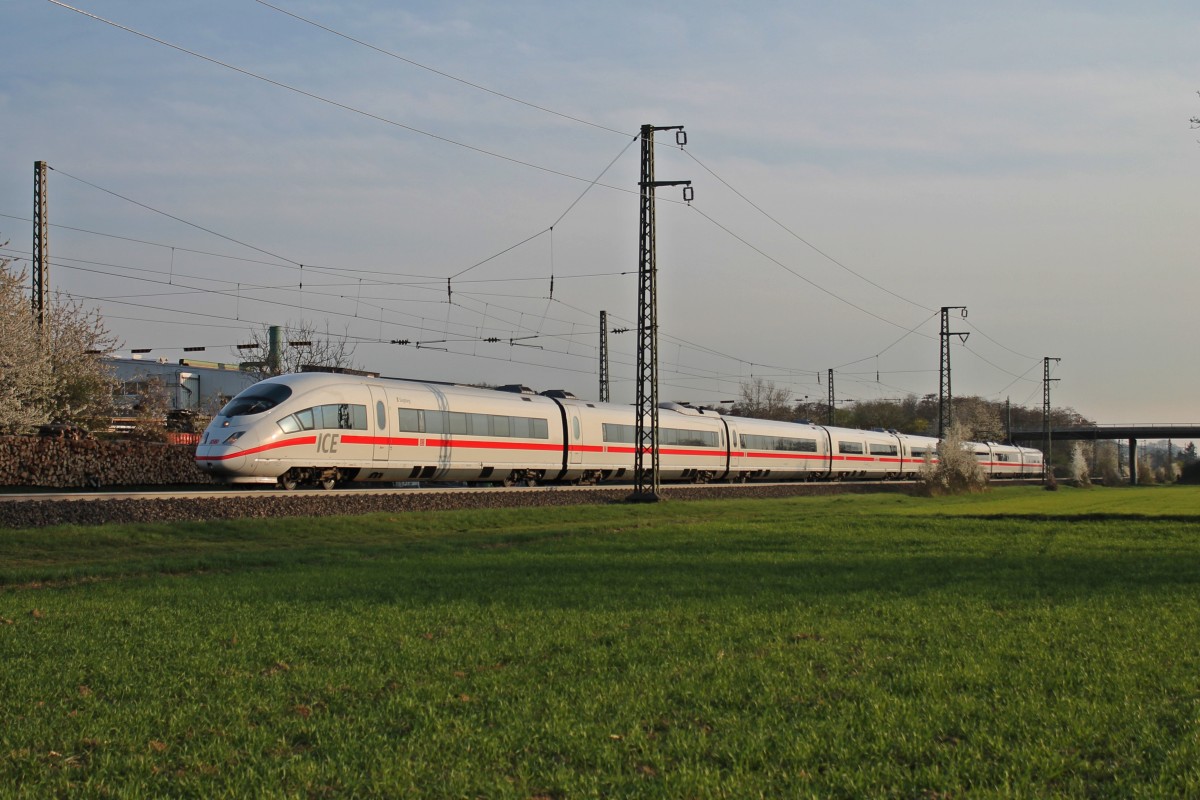 Am 29.03.2014 fuhr 403 016-9  Siegburg  als ICE 1102 (Basel SBB - Hannover Hbf) an der Fa. Jacoby in Auggen Richtung Freiburg vorbei.