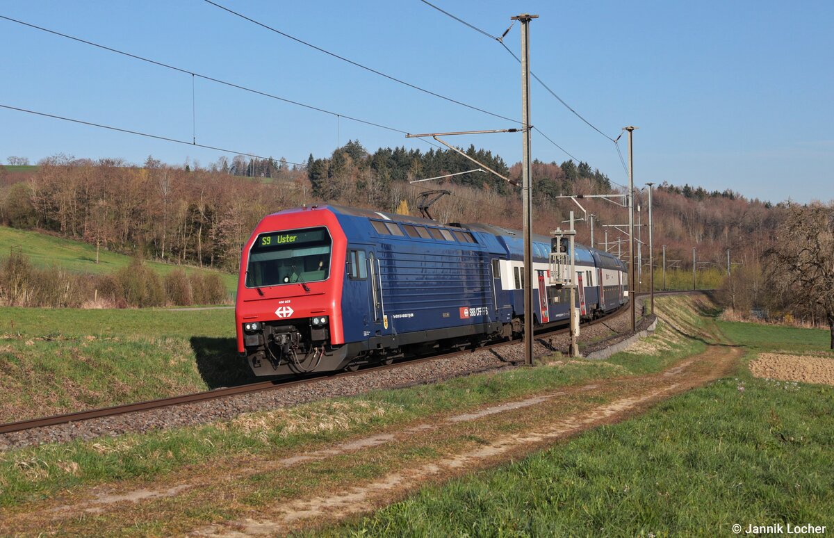 Am 3. April 2026 kam der SBB Personenverkehr Re 450 023 auf der S9 nach Uster durch Lottstetten. 