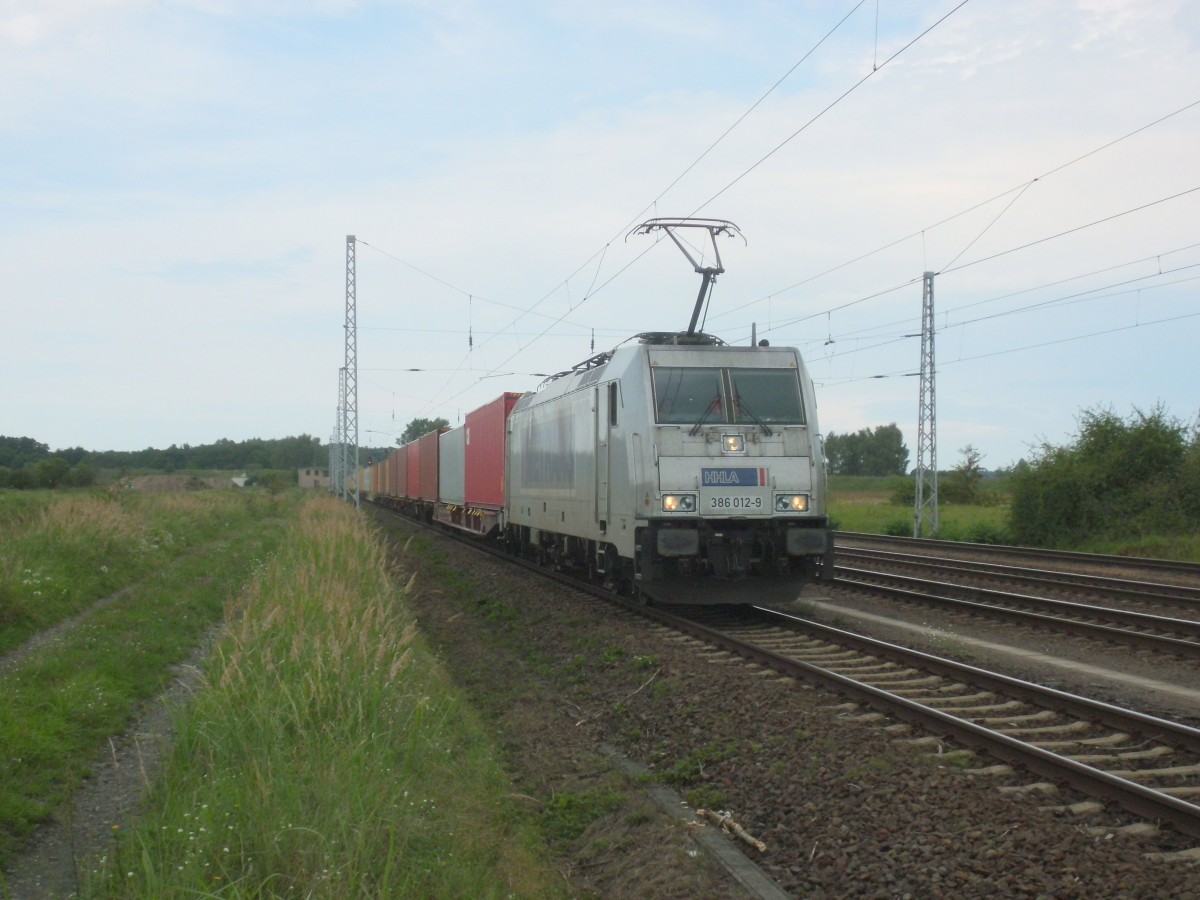 Am 30.08.2015 kam 386 012 aus Richtung Wittenberge nach Borstel und fuhr weiter in Richtung Stendal.