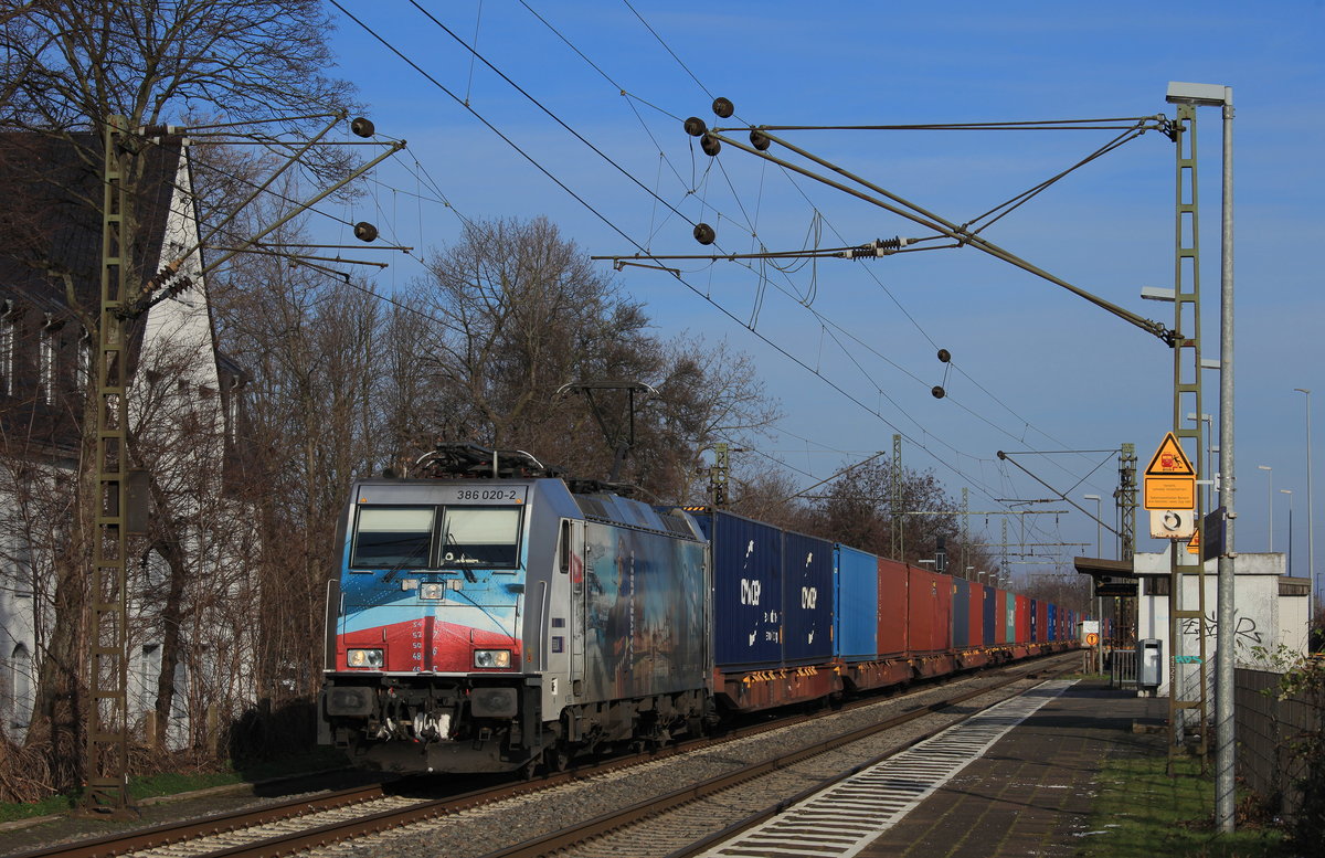 Am 31.01.2021 zog die Metrans Hamburg Werbelok 386 020 einen Containerzug aus Polen durch Rheinhuasen-Ost in den Gbf von Rheinhausen ein. 