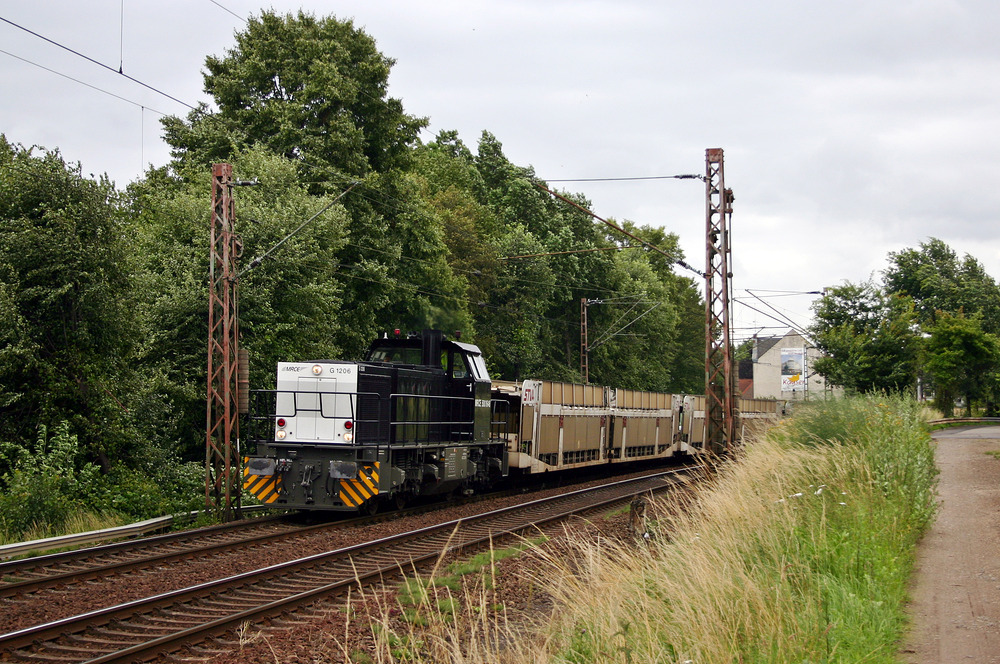 Am 7. Juli 2007 konnte ich in Pulheim MRCE 500 1648 mit leeren Autotransportwagen fotografieren.