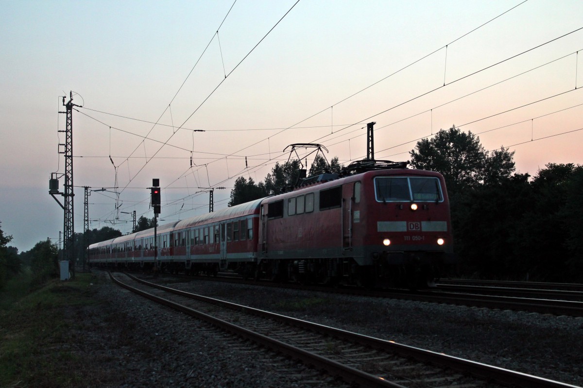 Am fr�hen Morgen des 11.07.2013 fuhr 111 050-1 als RB 26547 (Offenburg - Basel Bad Bf) in den Bahnhof von Orschweier ein.