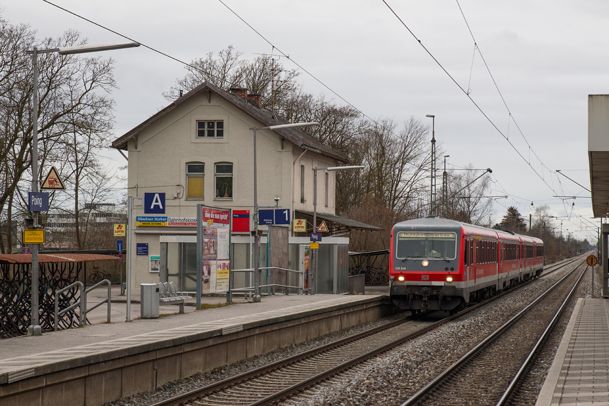 Am grauen Vormittag des 21.02.16 durchfährt der Mühldorfer 628 649-6 zusammen mit einem Schwesterfahrzeug von München Hbf nach Mühldorf den Haltepunkt Poing.