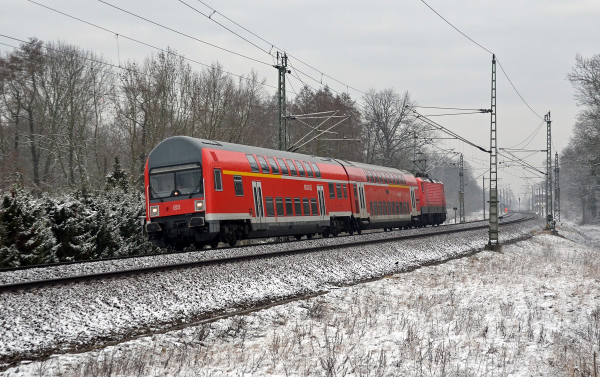 Am Morgen des 18.02.16 hat eine RB von Wittenberg kommend den Haltepunkt Burgkemnitz verlassen und setzt nun ihre Fahrt nach Halle(S) fort. Am Zugende schiebt 114 024.