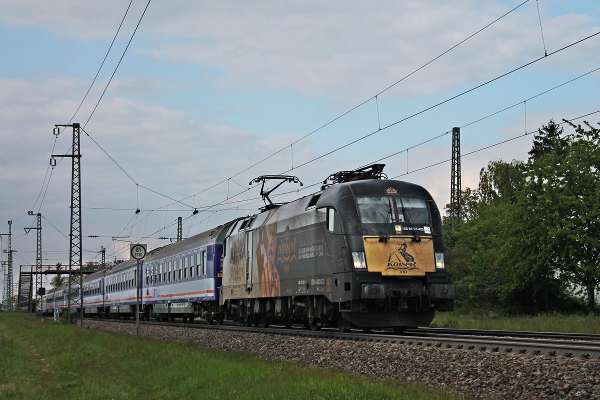 Am Nachmittag des 06.05.2019 fuhr MRCE/BTE ES 64 U2-023 (182 523-1)  Kaiser Franz Joseph von Österreich  mit einem Pilgerzug (Kratowice - Lourdes), welcher aus PKP Intercity-Wagen bestand, durch den Haltepunkt von Auggen über die KBS 703 durchs Rheintal in Richtung Basel, wo sie ihren Zug an die SBB übergeben wird.