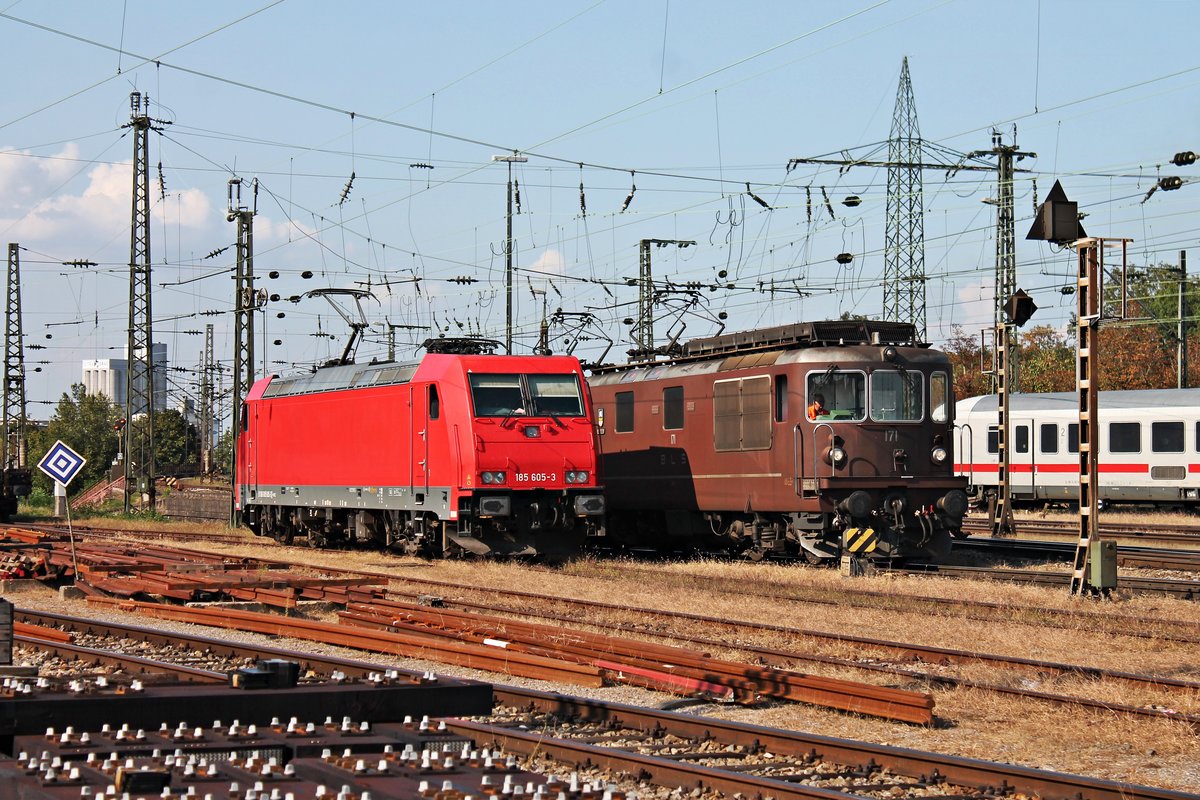 Am Nachmittag des 19.09.2018 stand ATLU/RHC 185 605-3 neben Re 4/4 171 (425 171-6)  Därligen  und Re 4/4 172 (425 172-4)  Eggerberg  im nördlichen Vorfeld vom Badischen Bahnhof von Basel. Während die zwei Re 4/4 auf die Einfahrt in die in den BLSC-Abstellbereich warteten, hat die 185er darauf gewartet aus dem Bahnhof zu rangieren, um ihre nächste Leistung zu übernehmen.