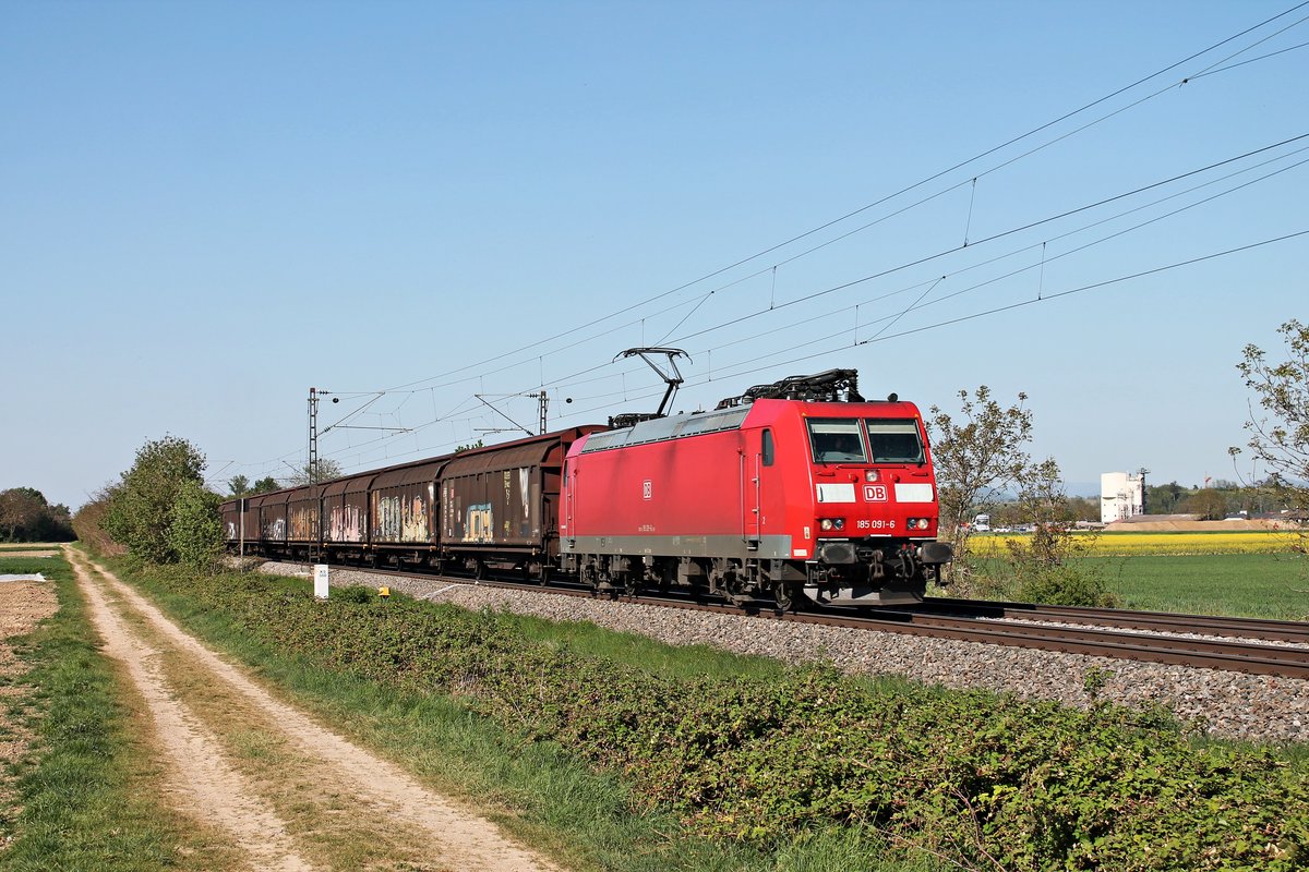 Am Nachmittag des 23.04.2020 fuhr 185 091-6 mit dem GK 49057 (Bremerhaven Kaiserhafen - Buchs SB) südlich von Buggingen über die Rheintalbahn in Richtung Müllheim (Baden).