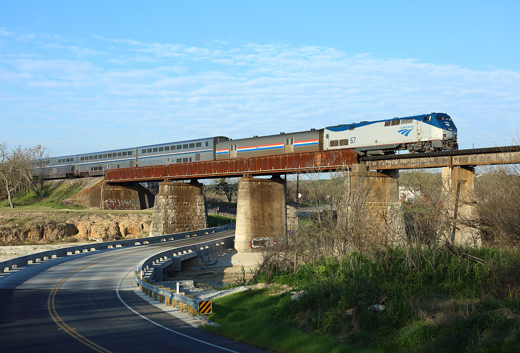 Amtrak no 67 crosses the Blanco River near San Marcos whilst hauling the Texas Eagle from San Antonio to Chicago, 14 March 2028