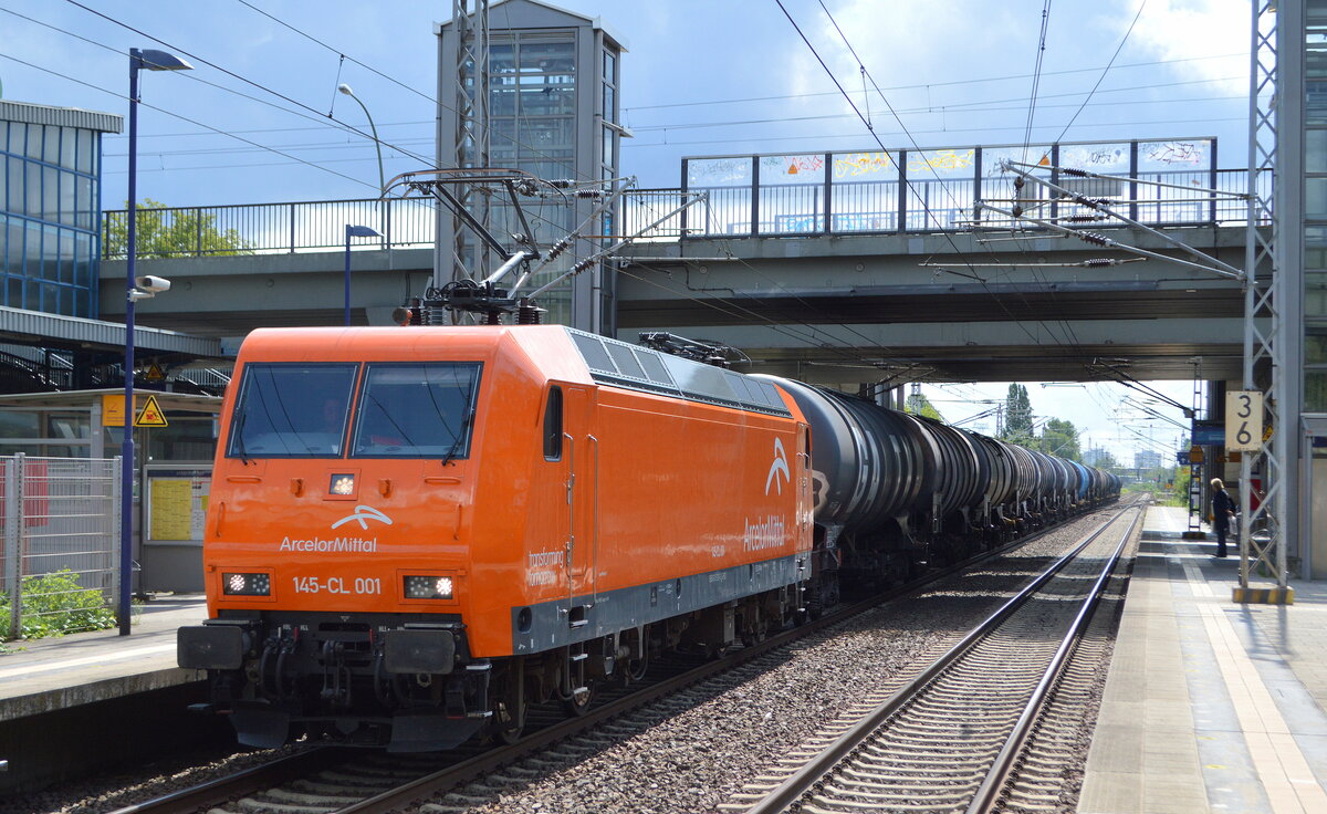 ArcelorMittal Eisenhüttenstadt Transport GmbH, Eisenhüttenstadt [D] mit  145-CL 001   [NVR-Nummer: 91 80 6145 081-6 D-EKO] und Kesselwagenzug (leer) Richtung Stendell am 03.08.21 Durchfahrt Bf. Berlin Hohenschönhausen.