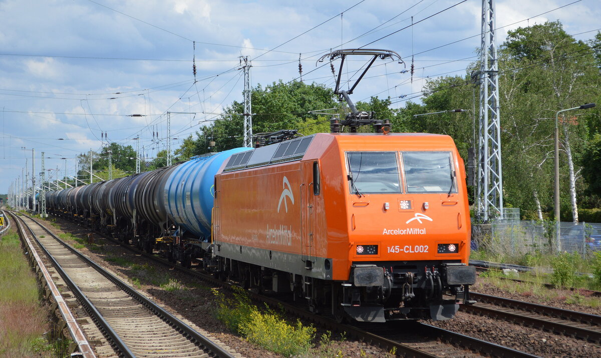 ArcelorMittal Eisenhüttenstadt Transport GmbH, Eisenhüttenstadt [D] mit  145-CL 002  [NVR-Nummer: 91 80 6145 082-4 D-EKO] und Kesselwagenzug (leer) am 31.05.22 Berlin Hirschgarten.