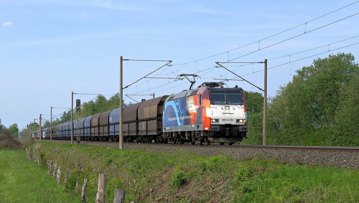 Ascendos Rail Leasing 185-CL 002 (185 502)  Salzgitter Mannesmann Precision , vermietet an CCW, mit leerem Schüttgutwagenzug Bremen Stahlwerke - Bottrop Süd in Richtung Osnabrück (Hüde, 10.05.16).