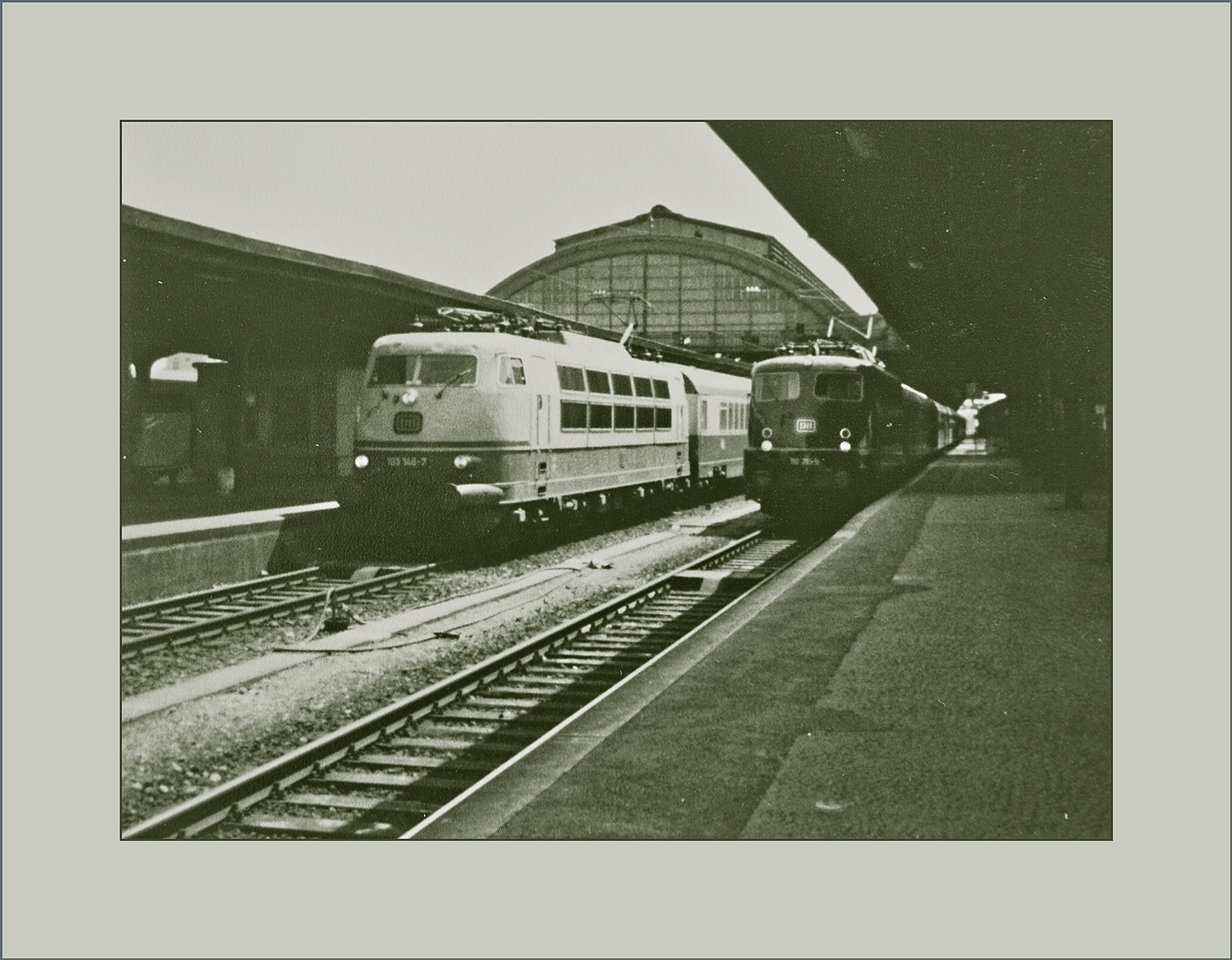 Auch bei diesem Bild ist die schöne Bahnhofshalle vom Badischen Bahnhof von Basel der Grund für die Präsentation des Bildes. Der Vollständigkeit halber noch kurz zu den beiden Zügen: Die DB 103 148-7 wartet mit dem Intercity  Otto Hahn  und die die DB 110 315-8 mit einem Schnellzug nach Dortmund in Basel Bad Bf. auf die Abfahrt.

Analogbild vom 23. August 1980