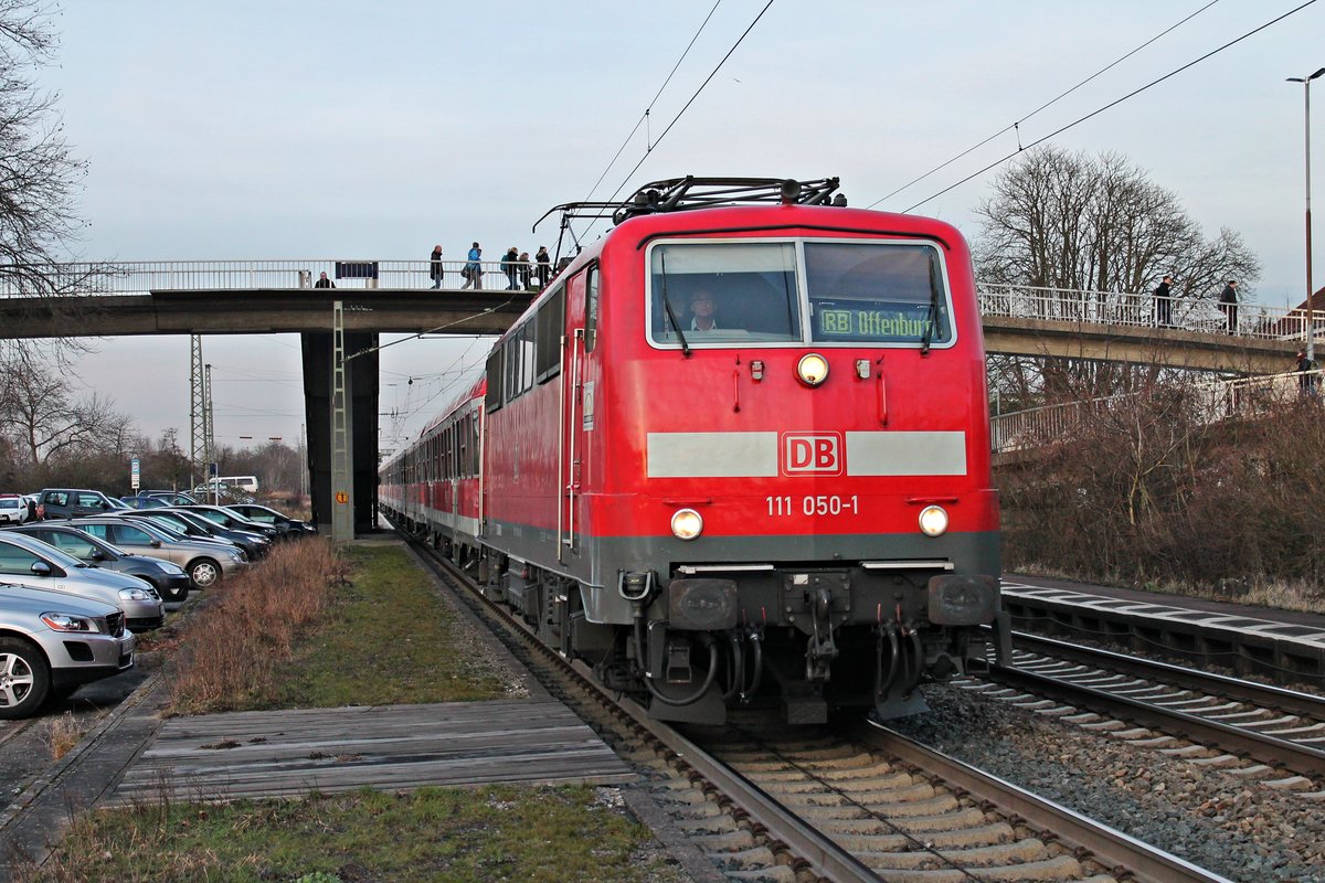 Ausfahrt am 03.02.2015 von der 111 050-1  RB Offenburg  mit einer RB (Offenburg - Basel Bad Bf) aus Orschweier gen Süden.