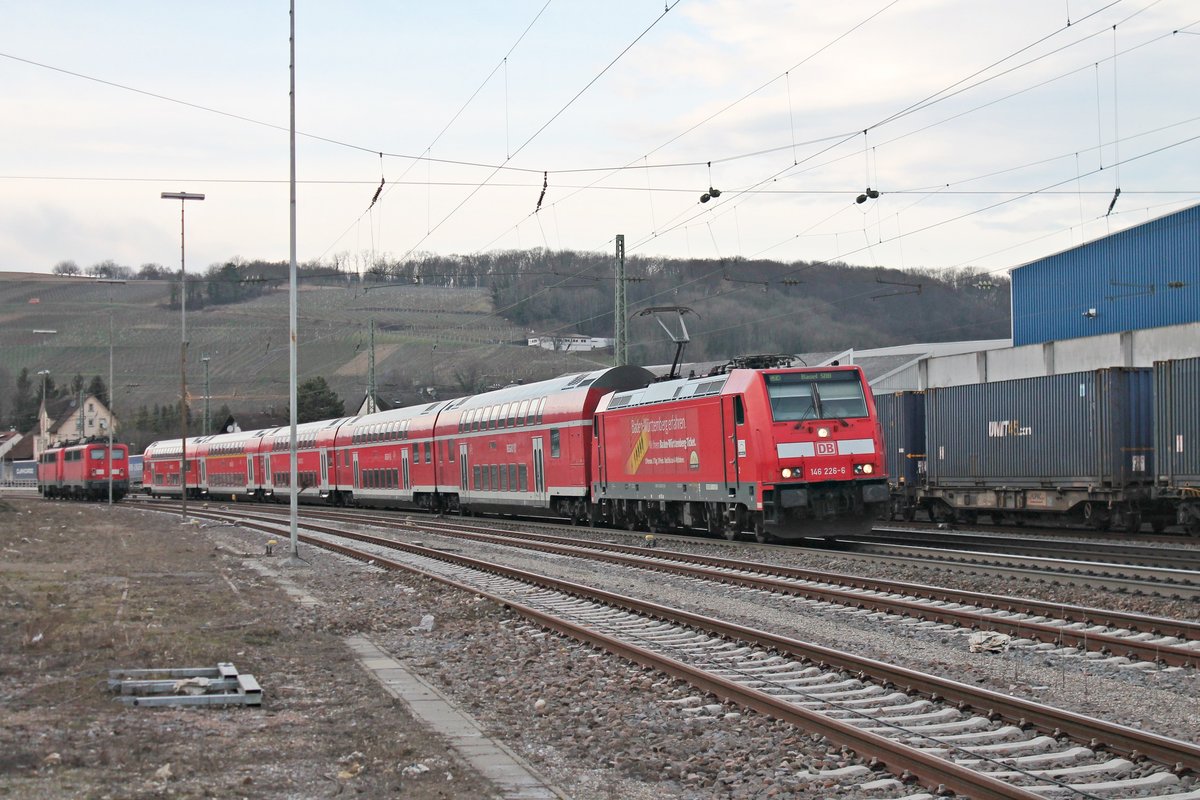 Ausfahrt am 23.02.2017 von 146 226-6  Baden Württemberg erfahren  mit ihrem RE (Offenburg - Basel SBB) aus dem Bahnhof von Efringen-Kirchen gen Eimeldingen.