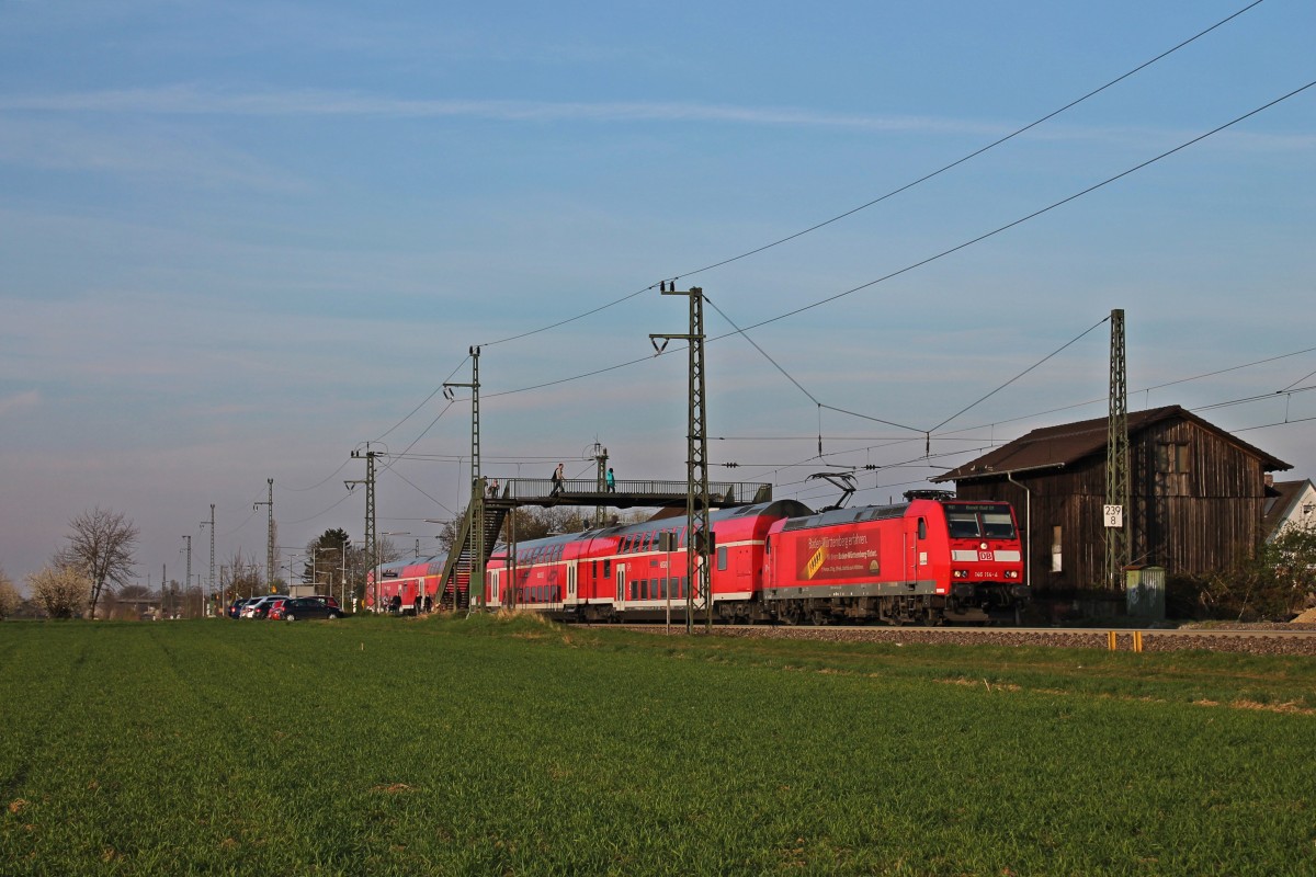 Ausfahrt am 29.03.2014 von der Freiburger 146 114-4  Baden-Württemberg erfahren  mit einem RE aus Offenburg nach Basel Bad Bf in Auggen.