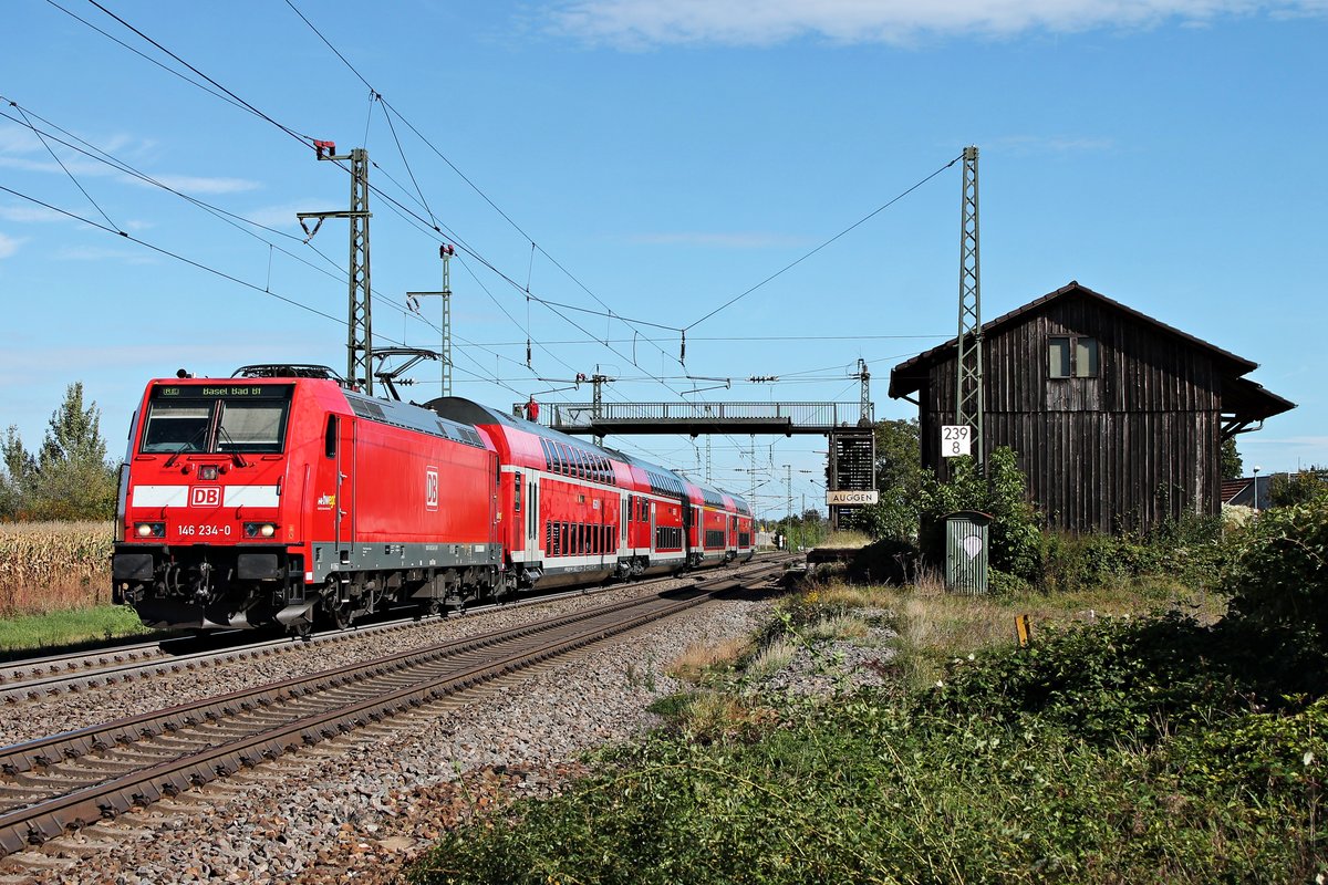 Ausfahrt am Vormittag des 29.09.2019 von der Freiburger 146 234-0 mit ihrem RE (Offenburg - Basel Bad Bf) aus dem Haltepunkt von Auggen in Richtung Schliengen.