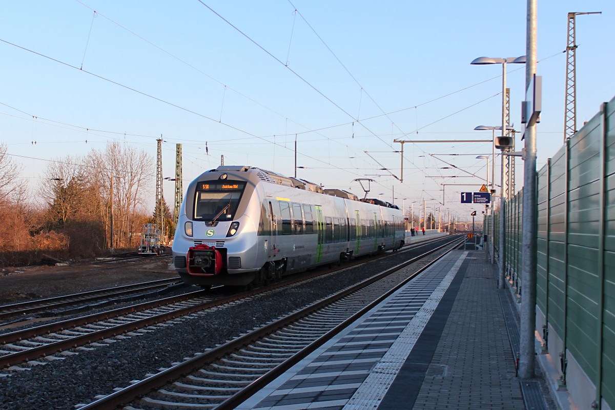 Ausfahrt aus dem Bahnhof Böhlen (b.Leipzig) hat die 1442 123 mit der SX nach Zwickau (Sachs)Hbf. 22.02.2014