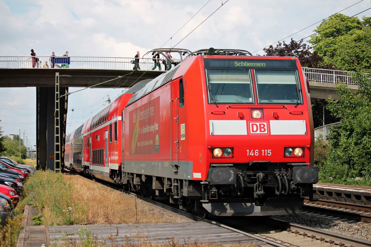 Ausfahrt von der Freiburger 146 115  Baden Württemberg erfahren  am 11.07.2014 mit einem RE (Offenburg - Schliengen) in Orschweier.