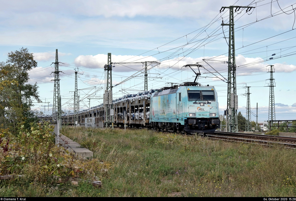Autotransportzug (BLG Logistics Group AG & Co. KG) mit 186 364-6  Wave Rider  überquert die Leipziger Chaussee (B 6) auf der Ostumfahrung für den Güterverkehr in Halle (Saale) Richtung Halle Rosengarten.

🧰 Akiem S.A.S., vermietet an die HSL Logistik GmbH (HSL)
🕓 4.10.2020 | 15:28 Uhr