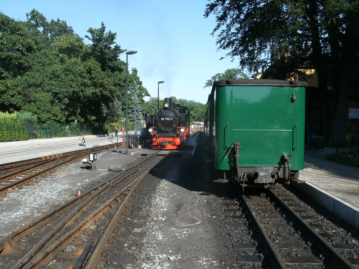 Bahnhof Ghren mit 99 1782 an der Wasserstation am 02.August 2013. 