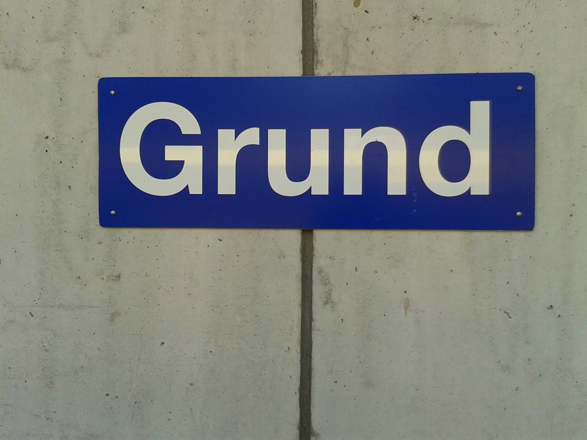 Bahnhofsschild von Grindelwald Grund am 23.7.2015