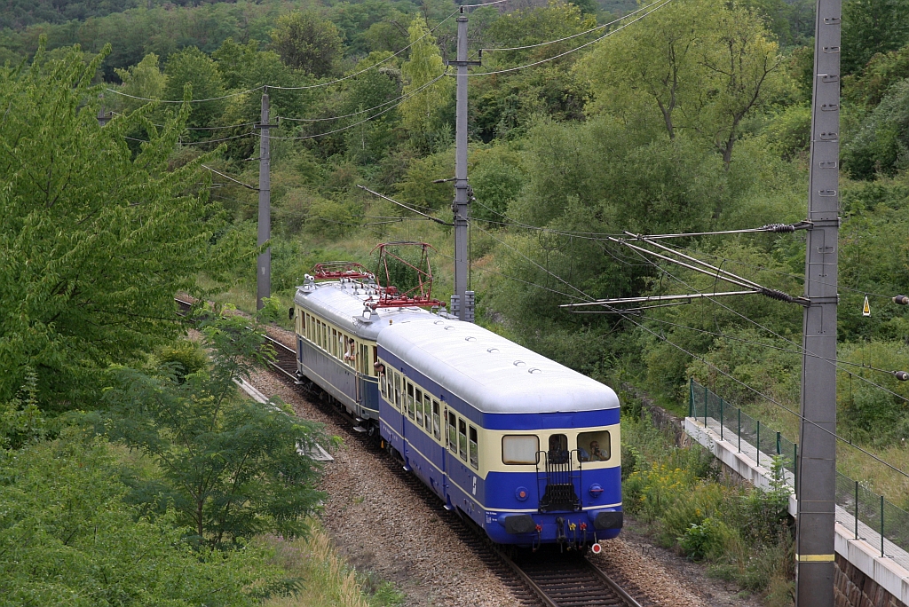 BIF 6546 210-1 B4VS am 17.August 2019 als letztes Fahrzeug des vom NBIK 4042.01 gezogenen SR 17032 (Sigmundsherberg - Wien Praterstern) kurz nach der Hangbrücke bei Limberg.