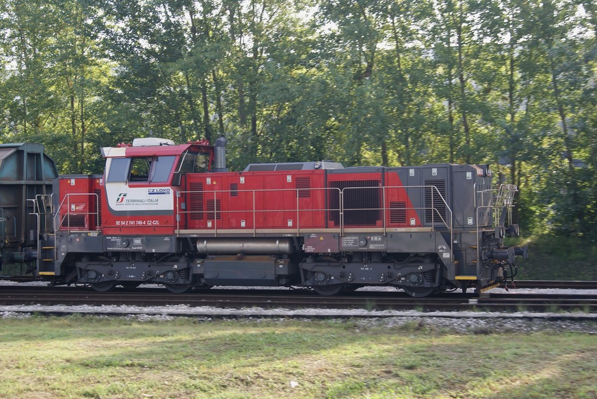 Bologna 27 sept 2019 diesel locomotive 741.745is shunting a long series of freight wagons  