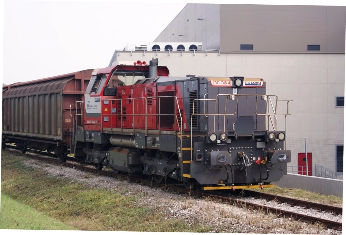 Bologna 27 sept 2019 diesel locomotive 741.745is shunting a long series of freight wagons