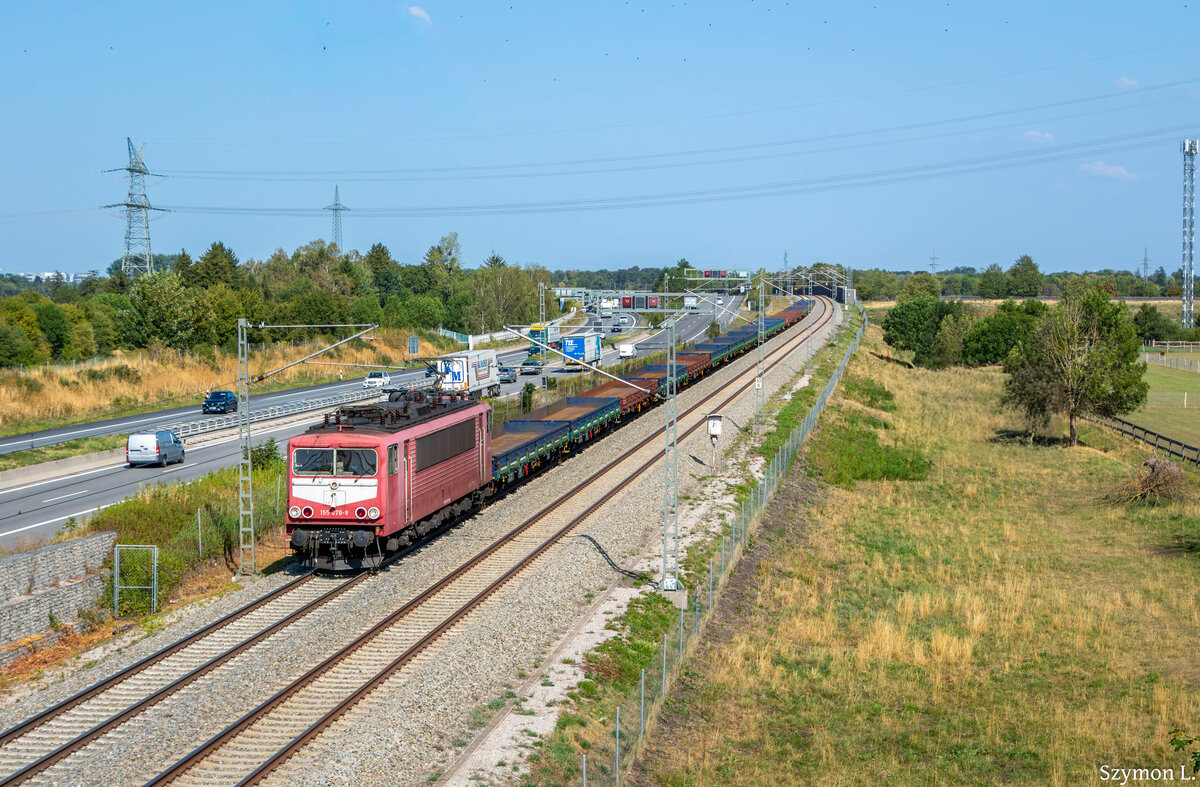 BR 155 078-9.
Am Mittwoch den 5.08 hatte ich das Gl�ck diesen  Container  mit leeren Flachwagen in Allach-Untermenzing zu fotografieren